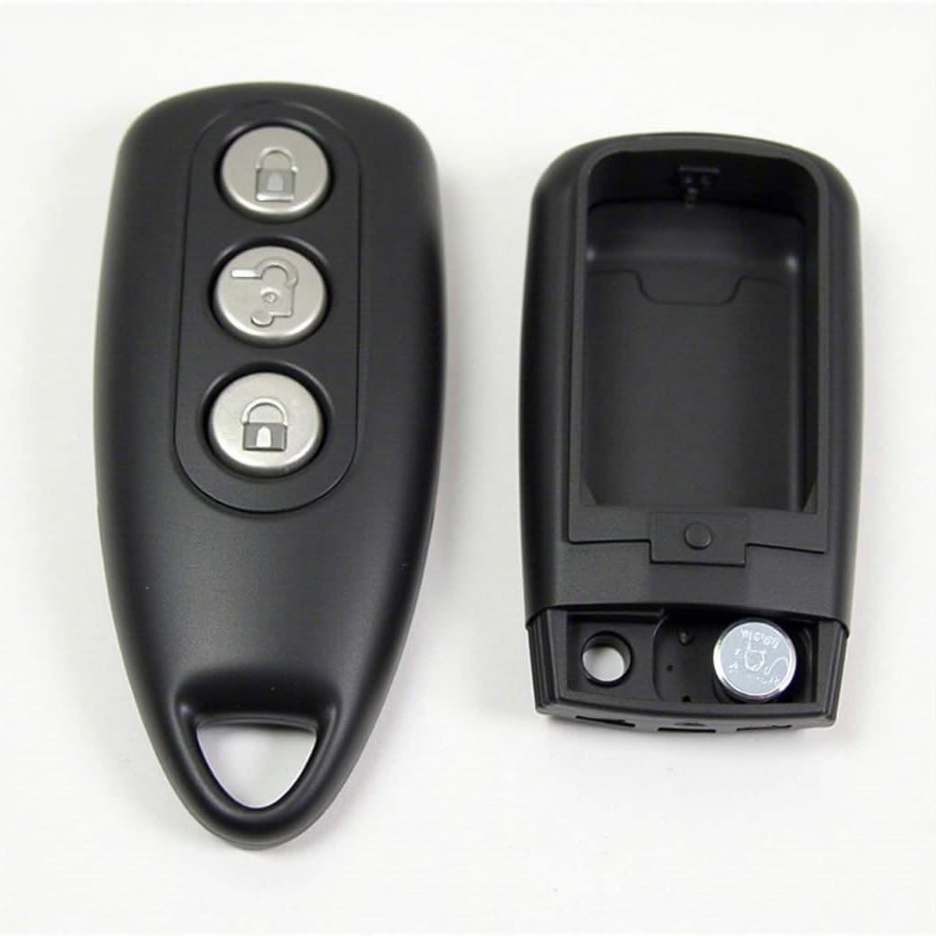 2005 GMC Envoy key fob with exposed battery compartment