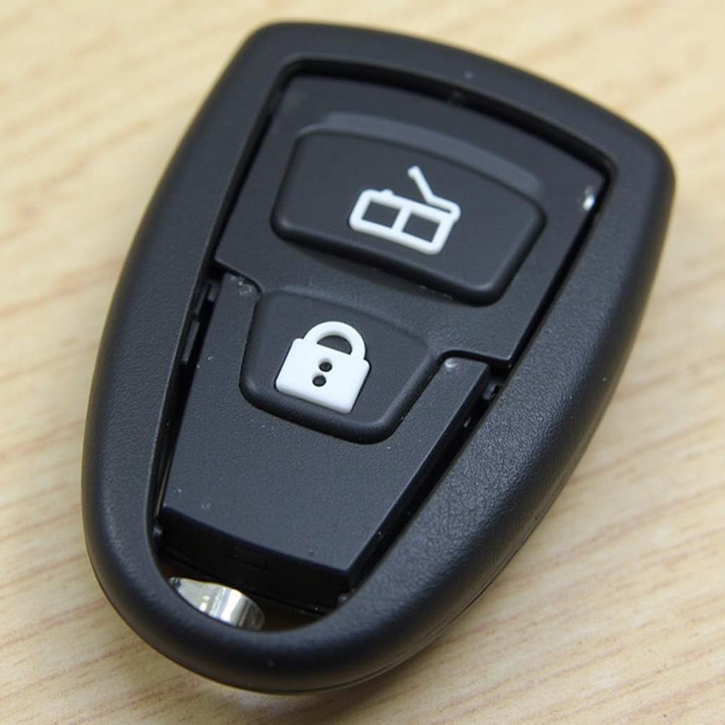 2011 Cadillac CTS key fob with its battery exposed