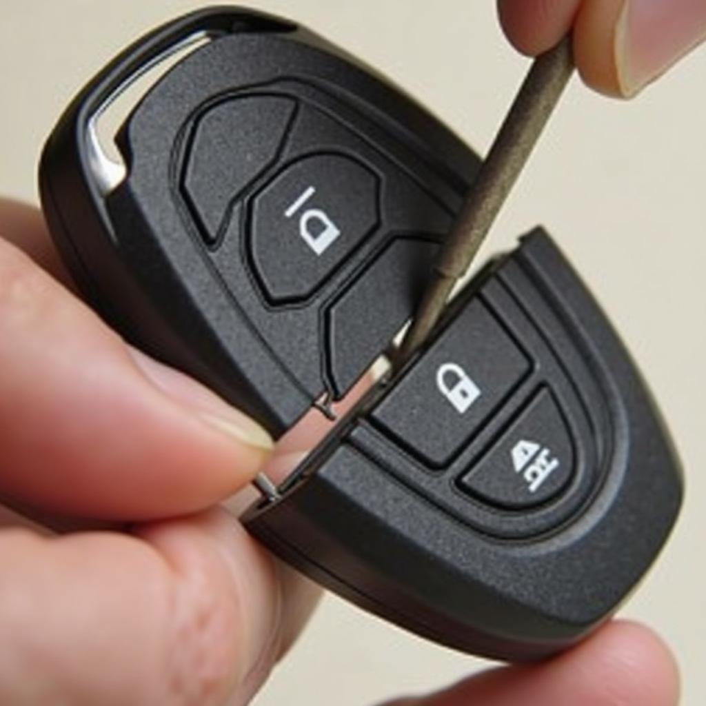 2013 Chrysler 300 key fob being separated