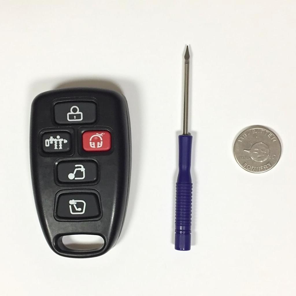 2013 Subaru Key Fob Battery Replacement Tools: Flathead Screwdriver and CR2032 Battery