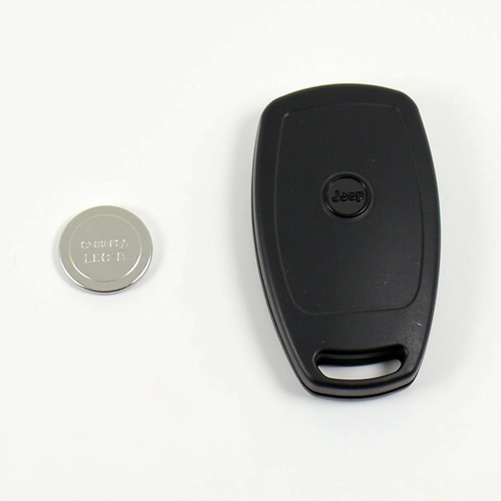 2014 Jeep Grand Cherokee key fob with a CR2032 battery