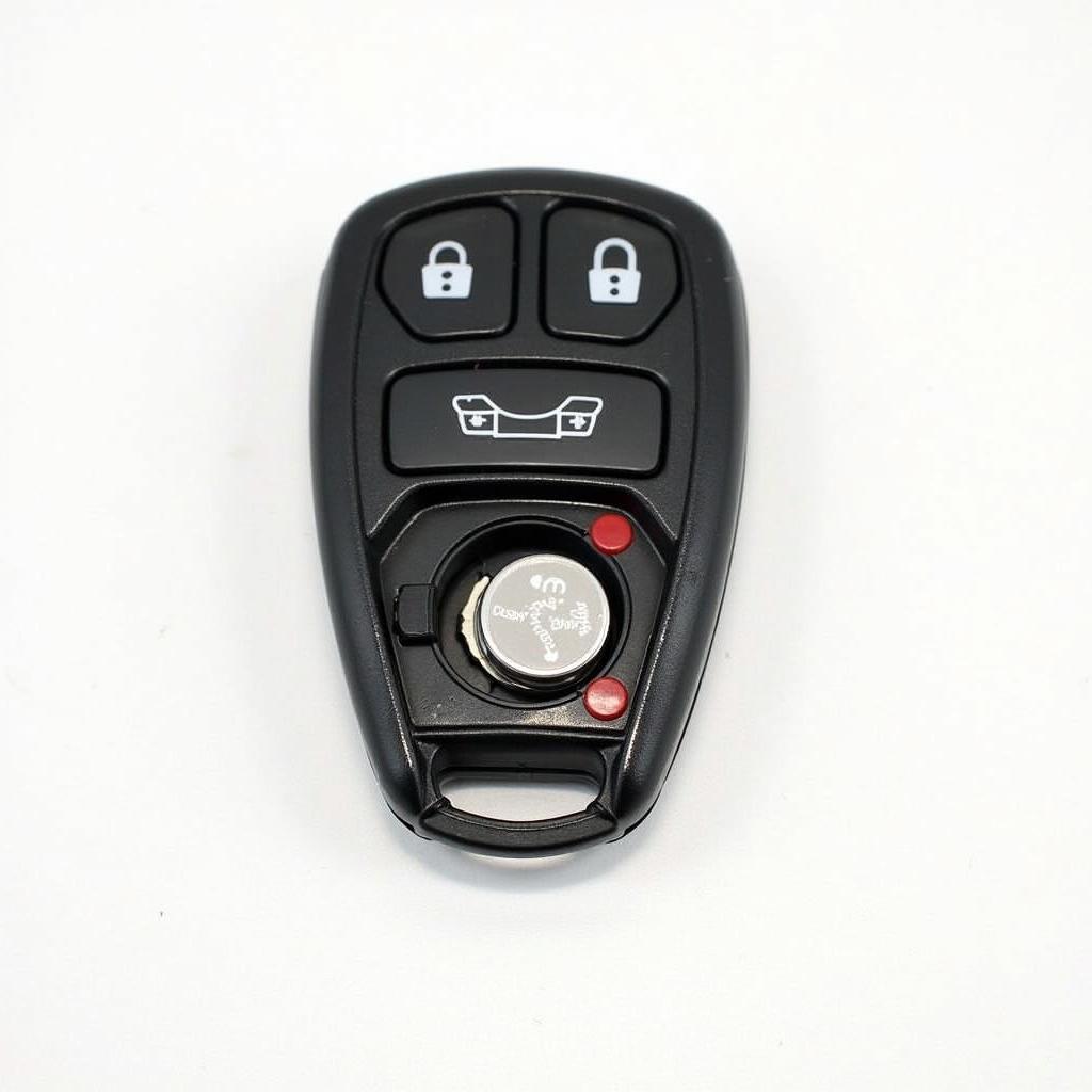 Opened 2015 Subaru WRX key fob with exposed battery compartment