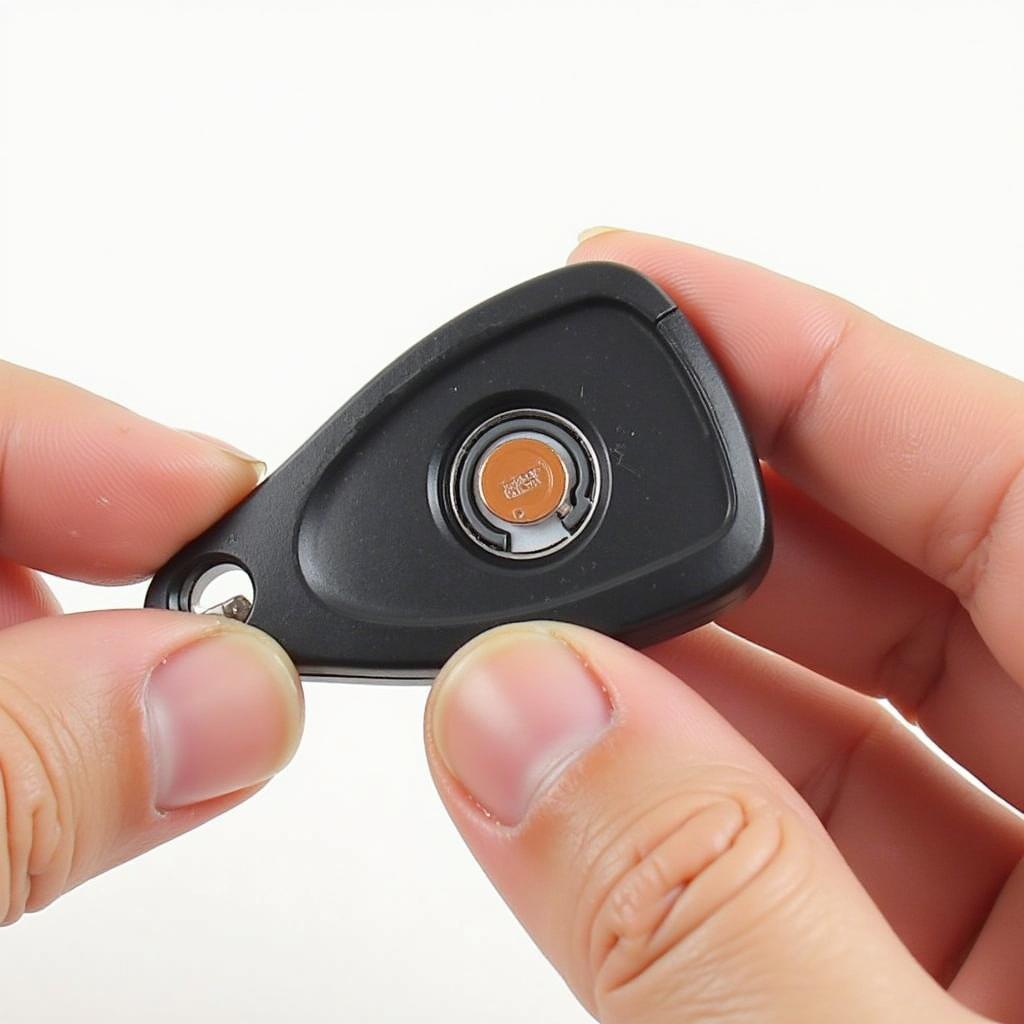 Inserting New CR2032 Battery in BMW i3 Key Fob