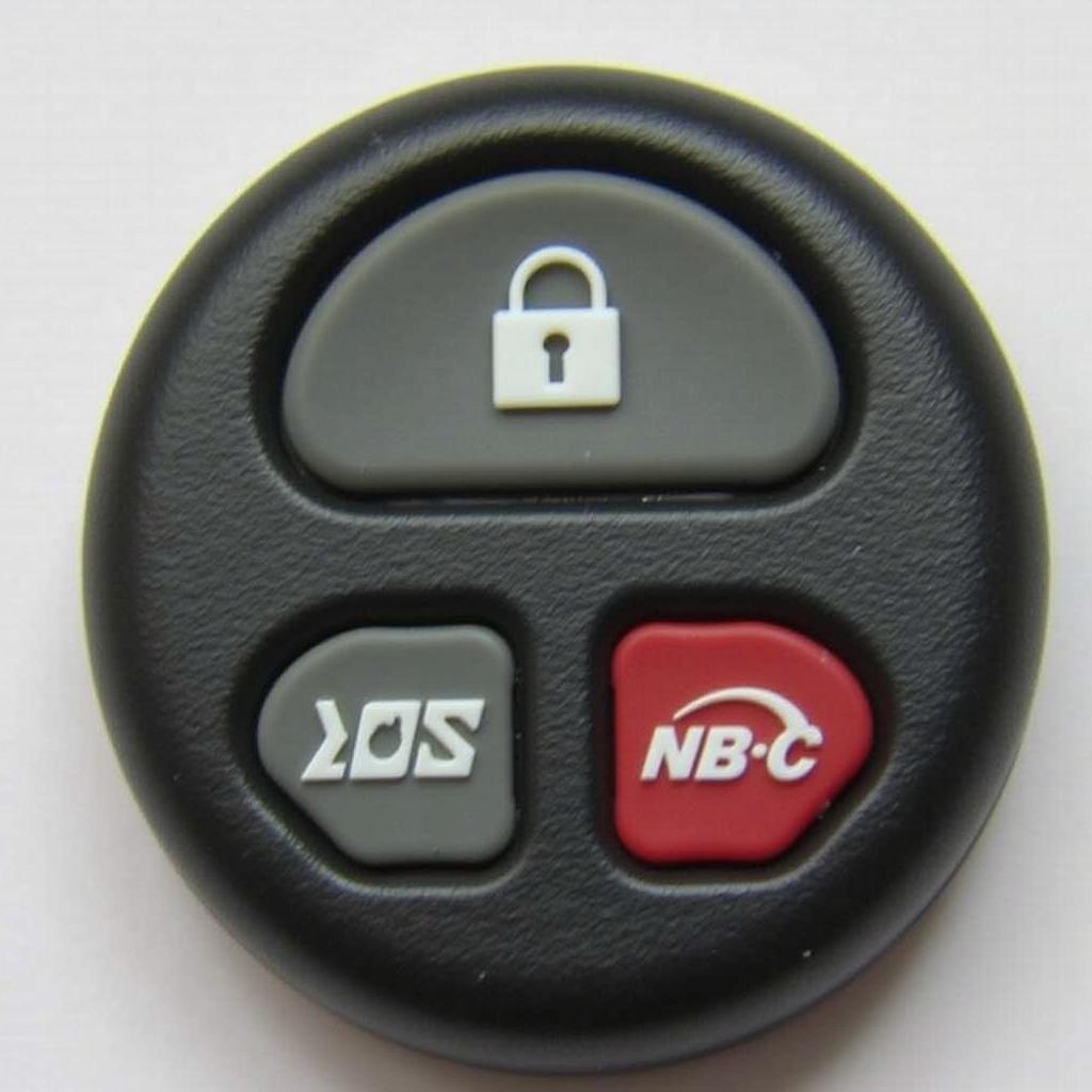 Jeep XJ Key Fob Identification - Close-up of a Jeep XJ key fob showing the part number and other identifying details.