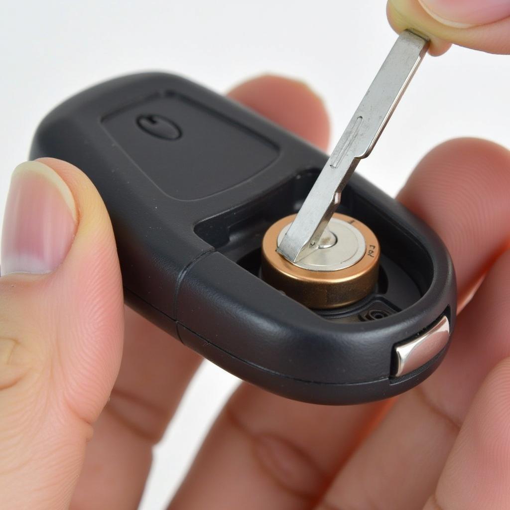 Inserting New Battery into Volvo XC60 Keyfob