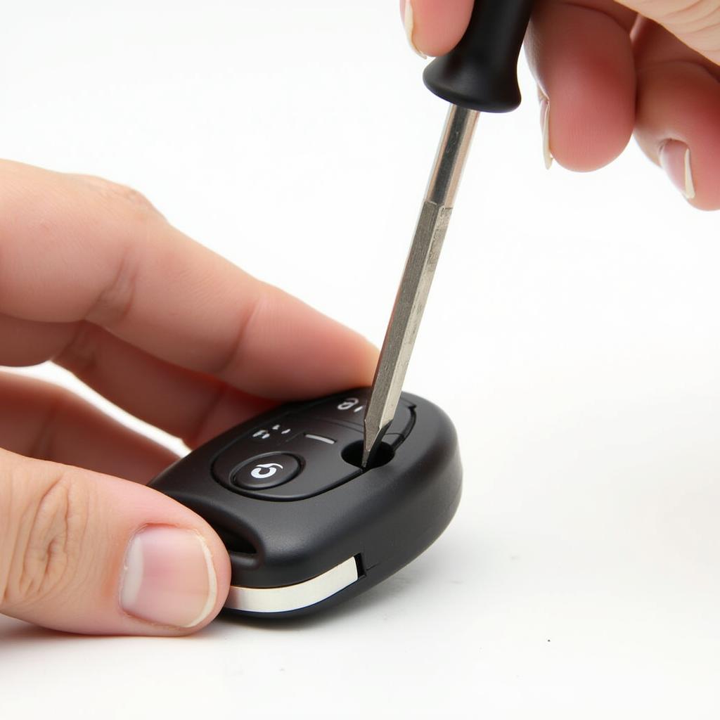 Opening the Battery Compartment of a 2018 GMC Key Fob