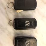 Opening a 2007 Acura MDX key fob to access the battery compartment