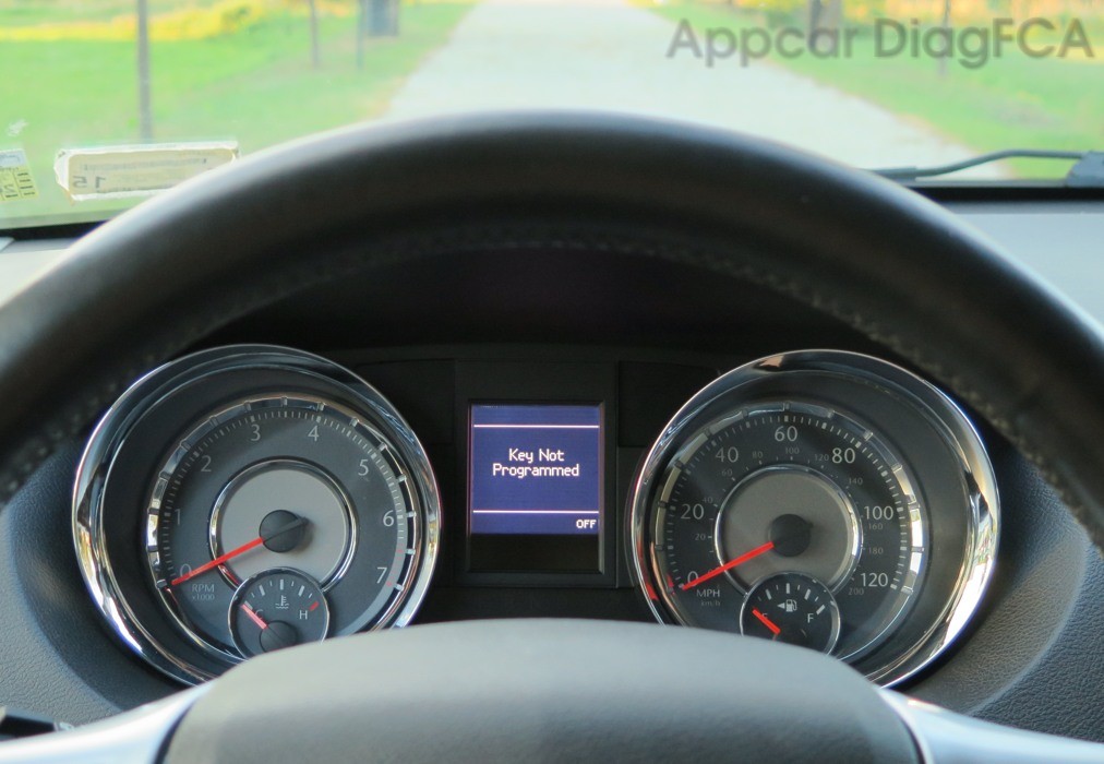 EVIC display showing 'Key Not Programmed' message in a Chrysler Town & Country.