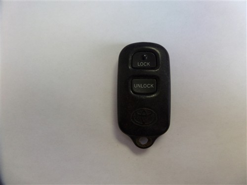 Front view of a 2005 Toyota Highlander key fob with three buttons: lock, unlock, and panic.