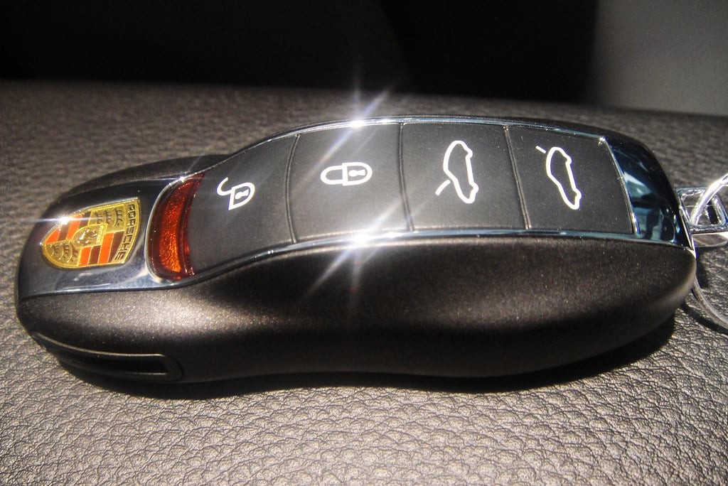 Programming a Porsche car key fob, illustrating the process of how to program a smart key fob for your vehicle.