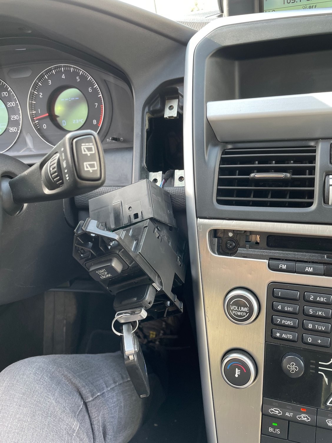 Accessing the ignition switch behind the CD player in a Volvo XC60