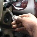 Inserting the Acura TL key into the ignition to start key fob programming